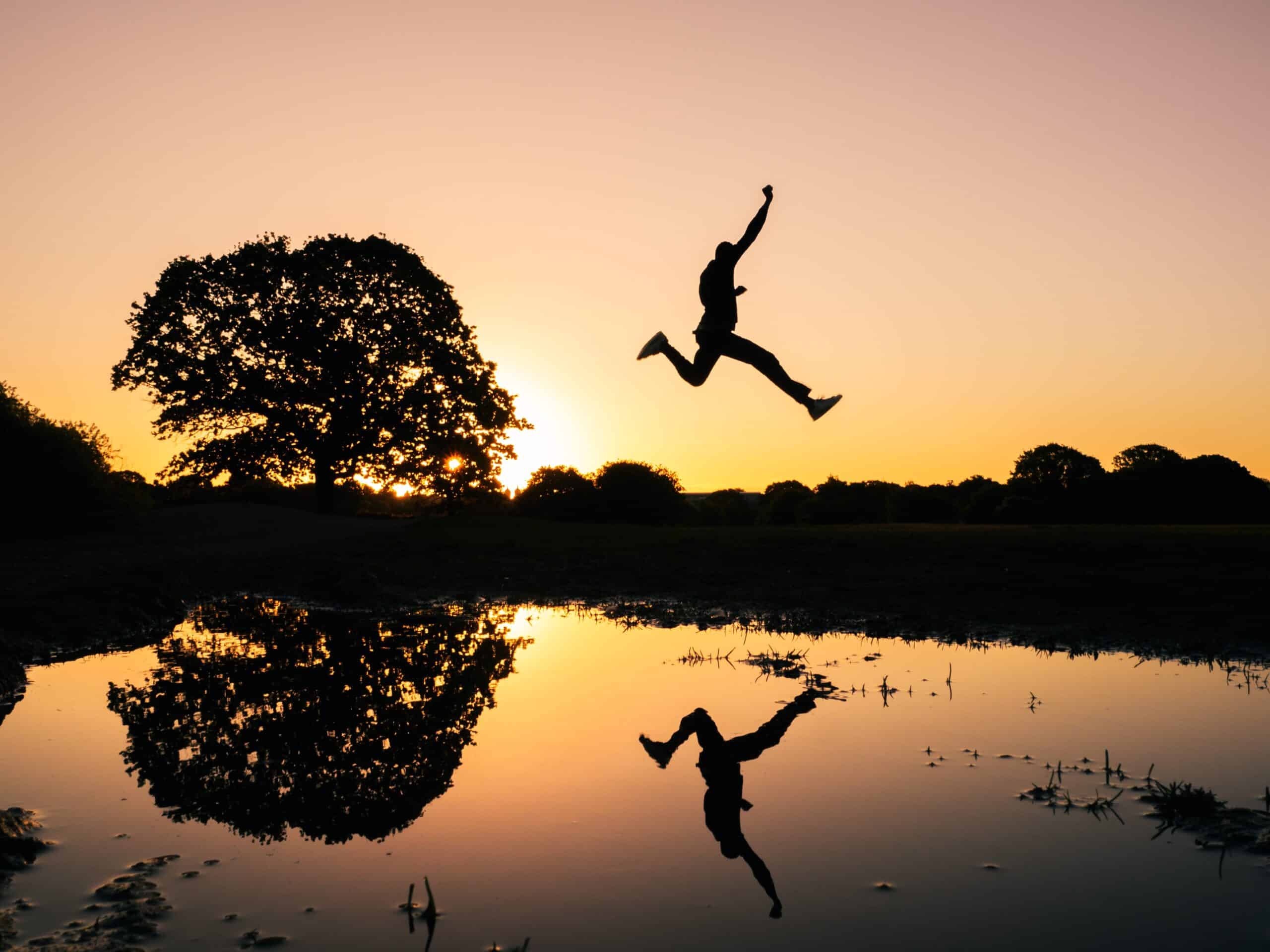 jump leap sunset